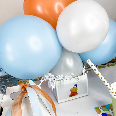 CENTRE DE TABLE EN BALLON POUR LE PREMIER ANNIVERSAIRE DE WINNIE L'OURSON